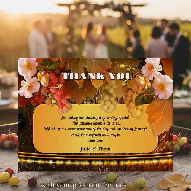 Invitación Vineyard or Winery Wedding Thank You Photo Card (Wedding Thank You card featuring grapes, peach colored roses and string lights on a wine barrel)