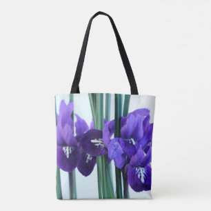 Iris Reticulata por todo la bolsa de asas de la