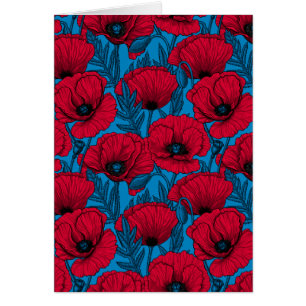 Jardín de amapolas rojas sobre azul