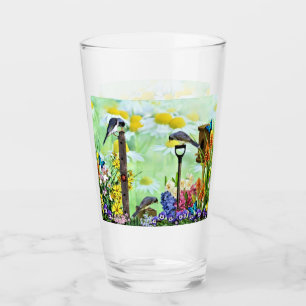 Jardín de flores de la casa de pájaros