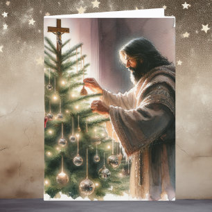 Jesús el Mesías decorando el árbol de Navidad