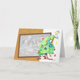 Jirafa que come el árbol de navidad