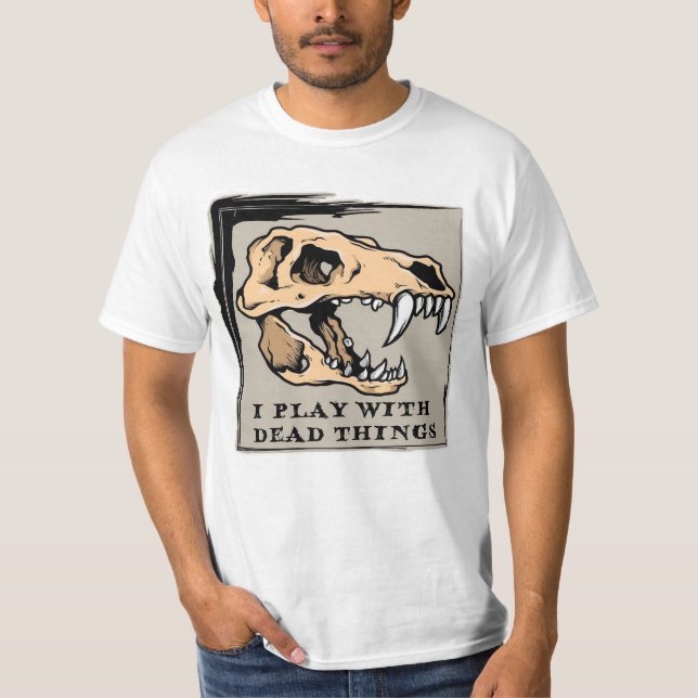Juego con Cosas Muertas - Fósiles / Camiseta Dinos (Anverso)