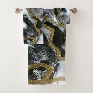 Juego de toallas de baño en blanco, negro y dorado