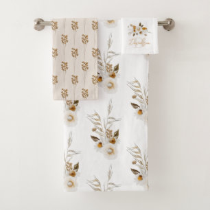 Juego de toallas monogramadas con flores en acuare
