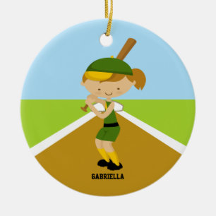 Jugador de softball lindo en el ornamento verde y