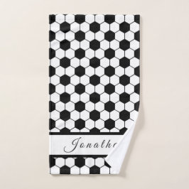 Jugadores de la pelota de fútbol niños negros y bl