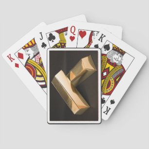 Jugando cartas con barras de oro