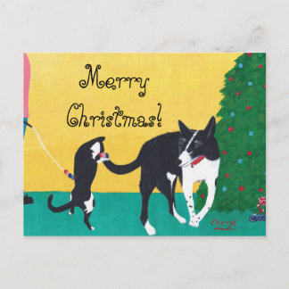 Jugando perro de gato con las postales navideñas d