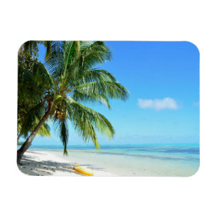 Kajak amarillo en un imán rectangular de la playa