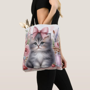 KITTEN DE FLUFFY CON FLORES Y UNA BOLSA ROSA