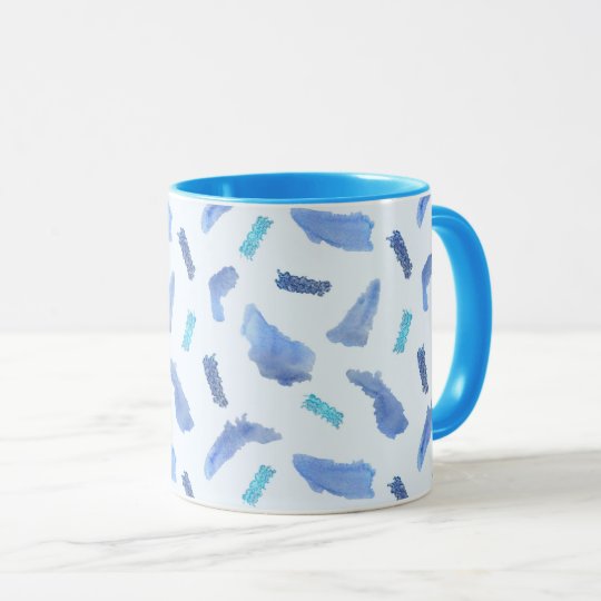 La acuarela azul mancha la taza combinada de 11