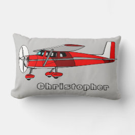 La almohada del muchacho lindo, aeroplano rojo con