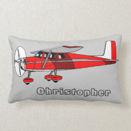La almohada del muchacho lindo, aeroplano rojo con