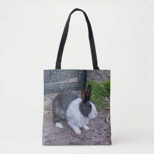 La bolsa de asas blanco y negro del conejo