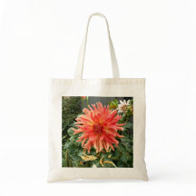 La bolsa de asas con la flor anaranjada grande
