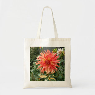 La bolsa de asas con la flor anaranjada grande