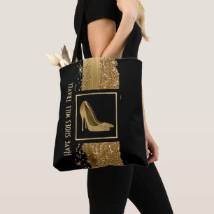 La bolsa de asas de oro de los tacones de aguja de
