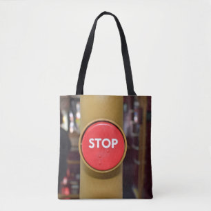 La bolsa de asas del botón de paro de autobús