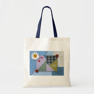 La bolsa de asas del edredón de remiendo