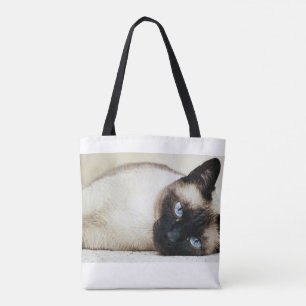 La bolsa de asas del gato siamés
