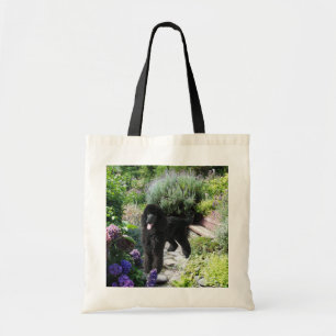La bolsa de asas del jardín del caniche