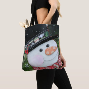 La bolsa de asas del muñeco de nieve del remiendo