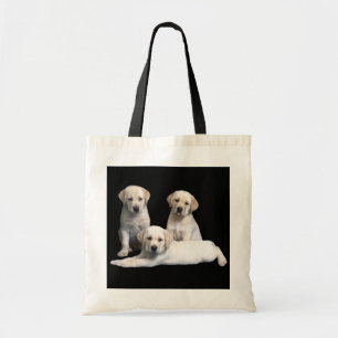 La bolsa de asas del perrito del labrador
