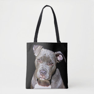 LA BOLSA DE ASAS DIVERTIDA DEL PERRO DE PITBULL