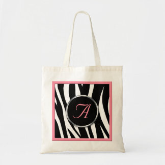 La bolsa de asas elegante del monograma del rosa