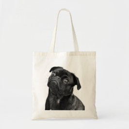 La bolsa de asas negra linda del barro amasado