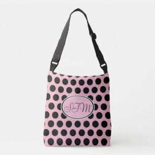 La bolsa de asas negra rosada del monograma del