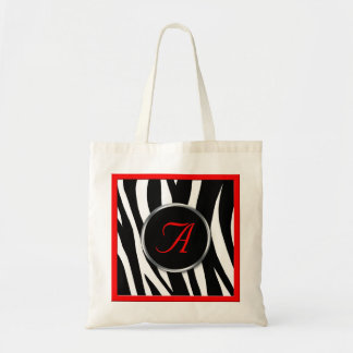 La bolsa de asas roja del monograma del estampado