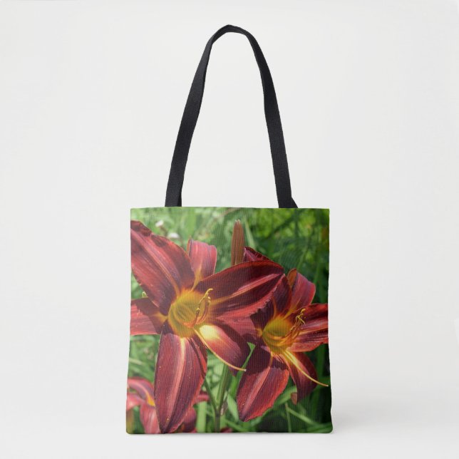La bolsa de asas rojo oscuro de los lirios (Anverso)