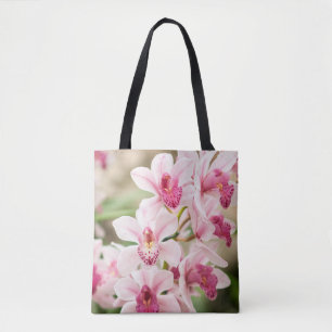 La bolsa de asas rosada de la orquídea