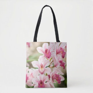 La bolsa de asas rosada de la orquídea