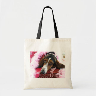 La bolsa de asas rosada del perro de la diva