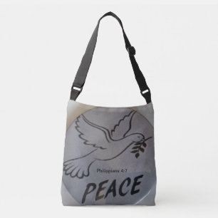 La bolsa presenta paloma de la paz y escritura.