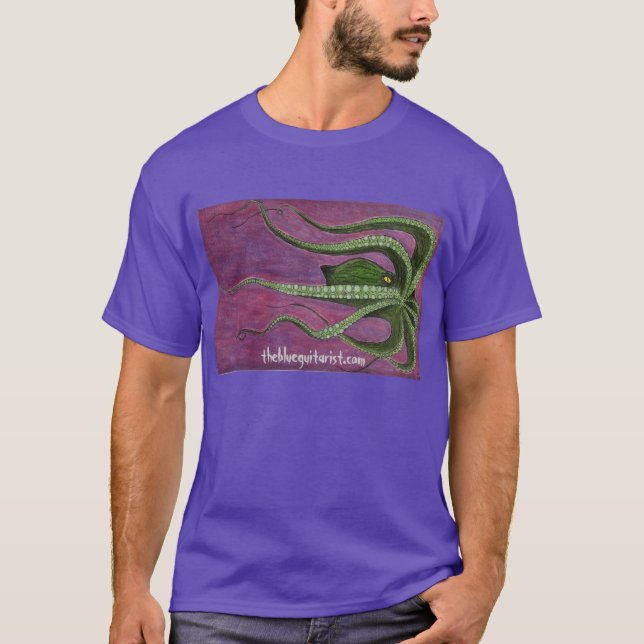La camiseta azul de "Mammon" del guitarrista (Anverso)