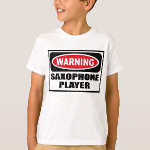 La camiseta de SAXOFÓN del niño amonestador del