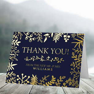 La elegante colección de bodas floral navy y oro
