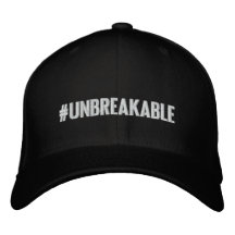 La etiqueta #UNBREAKABLE FlexFit Gorra