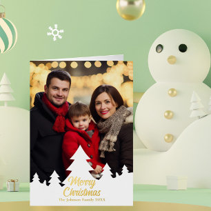 La familia de los árboles navideños modernos foto 
