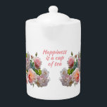 La felicidad es una taza de té elegante de tetera<br><div class="desc">Esta elegante tetera floral tiene rosas rosadas de bonito y cita: La felicidad es una taza de té. Hace un regalo maravilloso para los amantes del té.</div>
