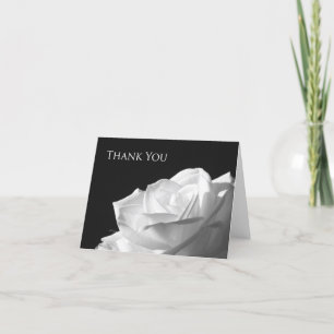 La flor en blanco le agradece tarjeta de nota --