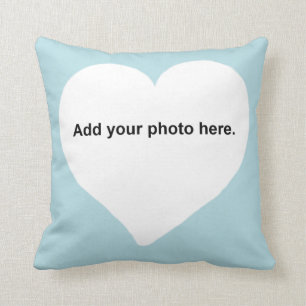 La forma del corazón añade su almohada de la fot