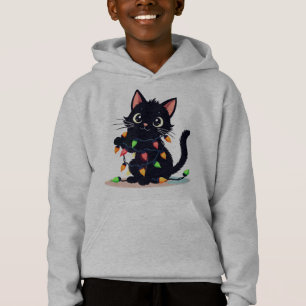 La iluminación divertida de los gatos de los Navid