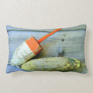 La langosta de madera vieja buoys la almohada