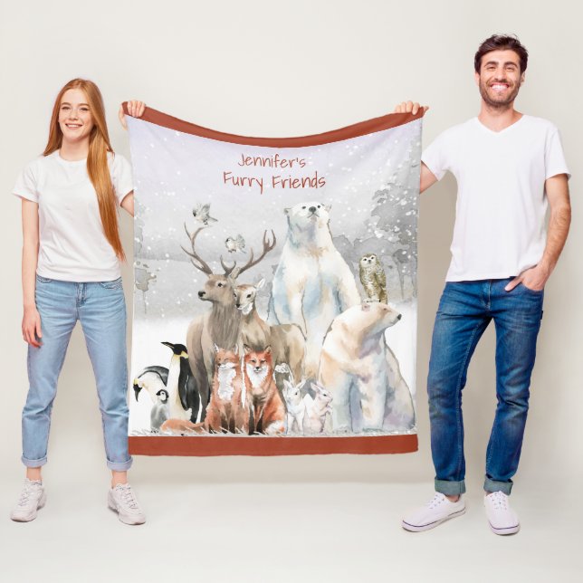 La manta con el nombre del niño, los animales, el  (In situ)