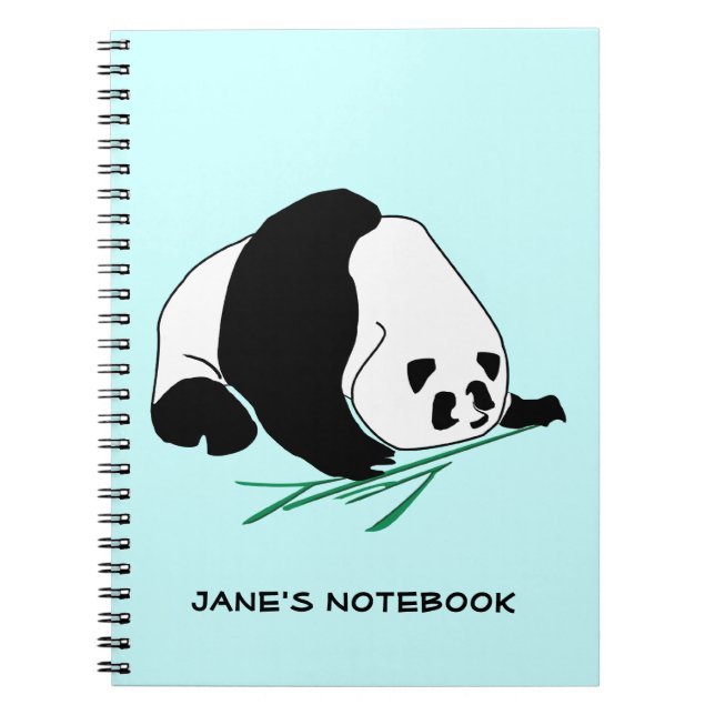 La panda blanco y negro come el cuaderno de bambú (Frente)